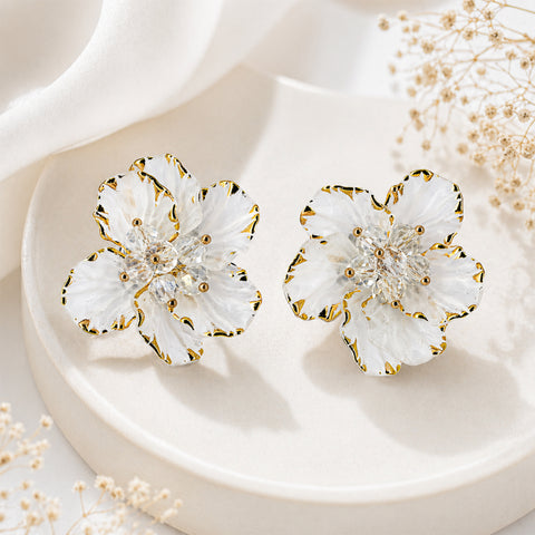 Elegant White Blossom Stud Earrings with Gold-Trimmed Petals and Crystal Center