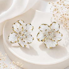 Elegant White Blossom Stud Earrings with Gold-Trimmed Petals and Crystal Center
